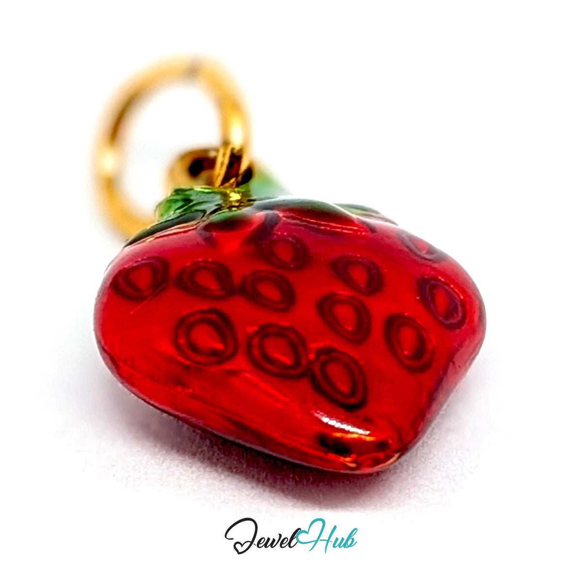 Angled view of the gold-tone red enamel strawberry charm - JewelHub