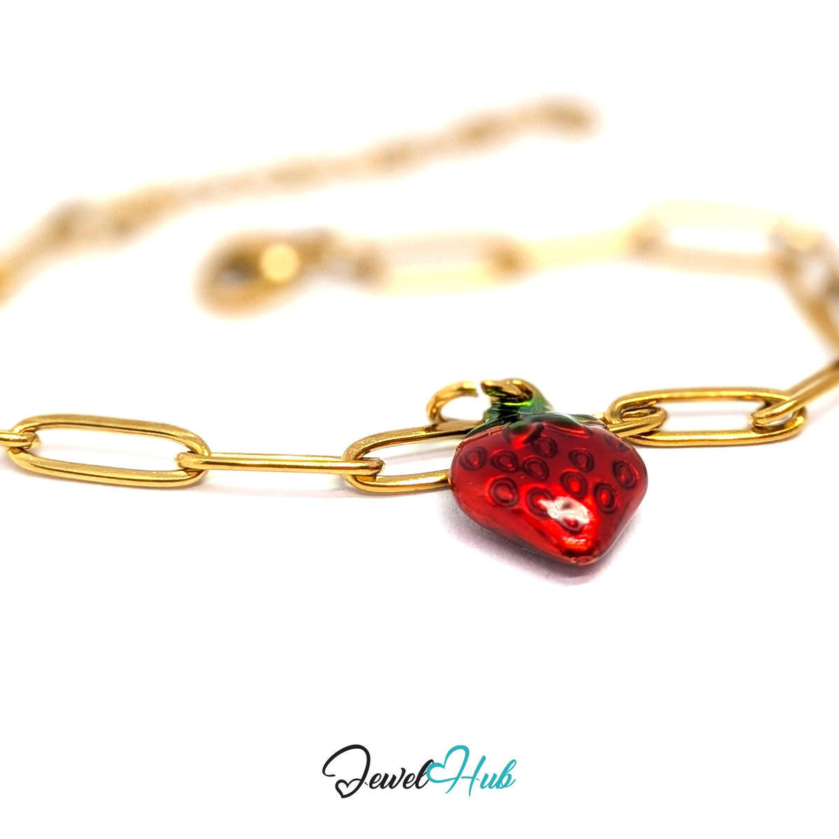 Gold-tone red enamel strawberry charm styled on a gold paperclip chain bracelet - JewelHub