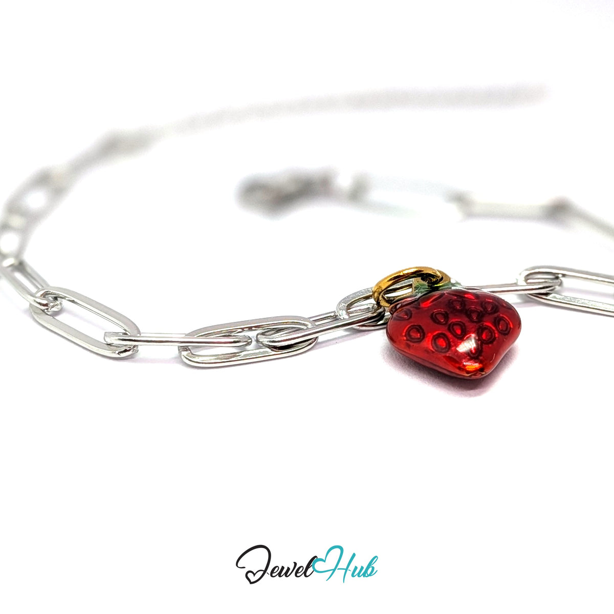 Gold-tone red enamel strawberry charm styled on a silver paperclip chain bracelet for a two-tone look - JewelHub