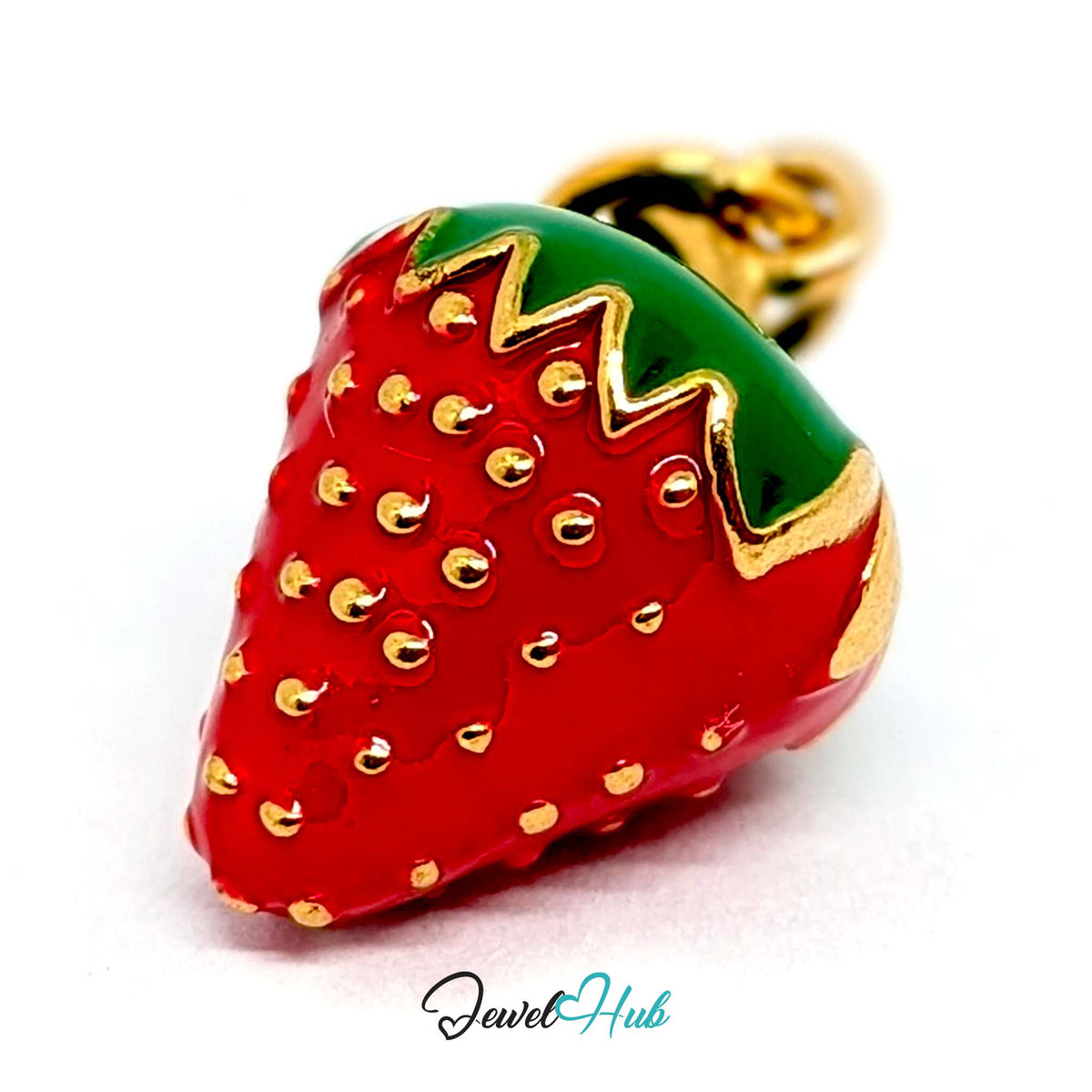 Close-up of the gold-tone 3D red enamel strawberry charm detail - JewelHub