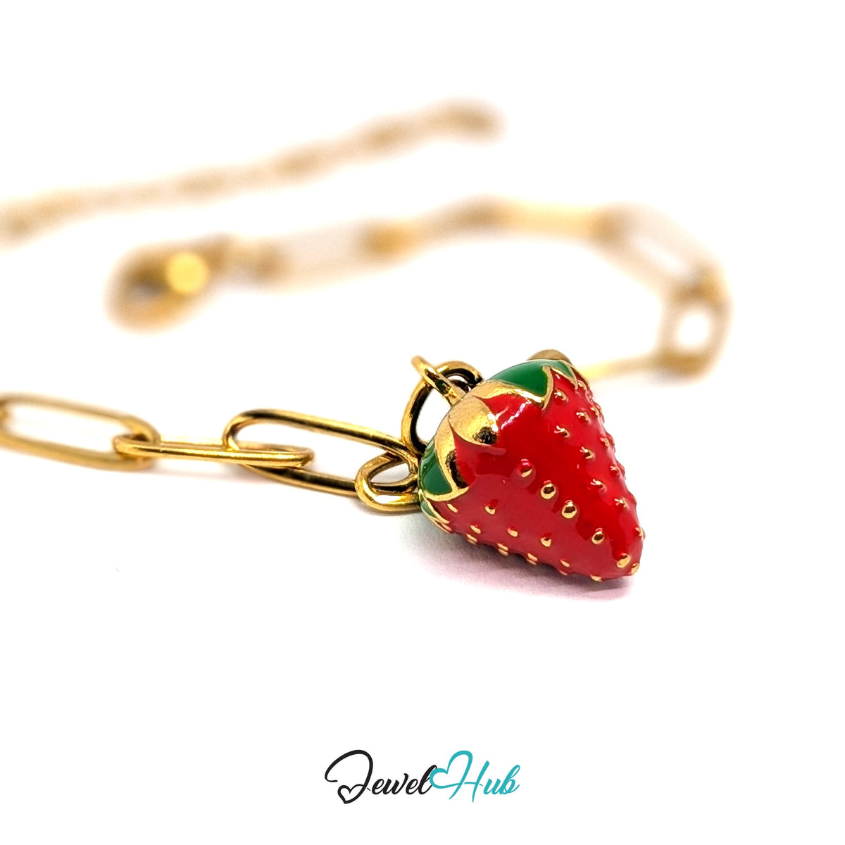 Gold-tone 3D red enamel strawberry charm styled on a gold paperclip chain bracelet - JewelHub
