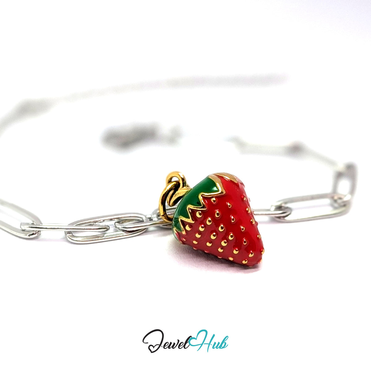 Gold-tone 3D red enamel strawberry charm styled on a silver paperclip chain bracelet for a two-tone look - JewelHub