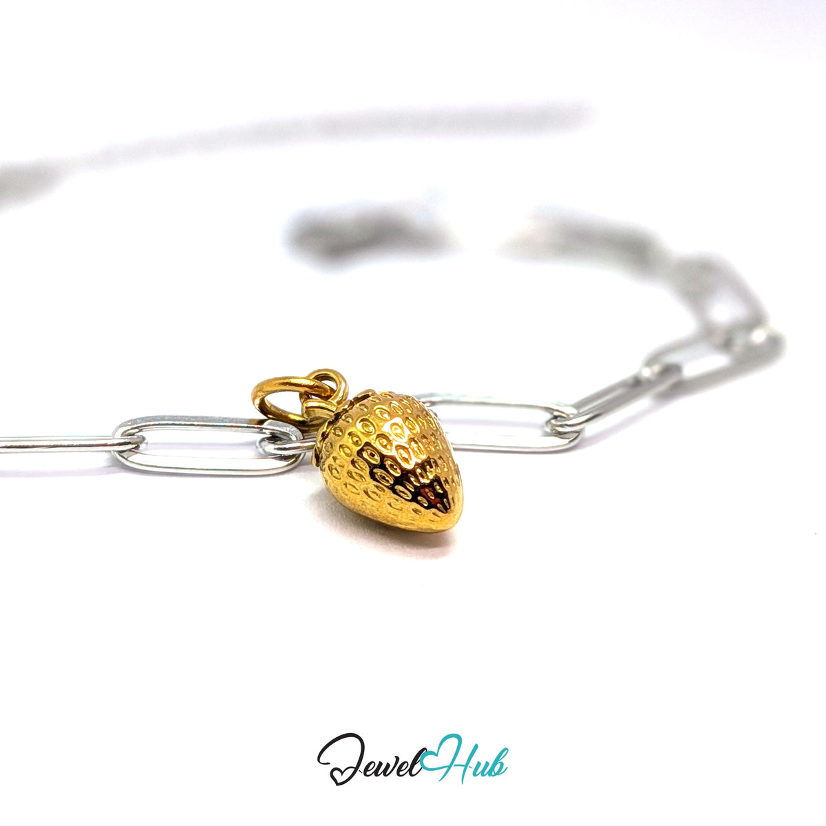 Gold-tone mini 3D strawberry charm styled on a silver paperclip chain bracelet for a two-tone look - JewelHub