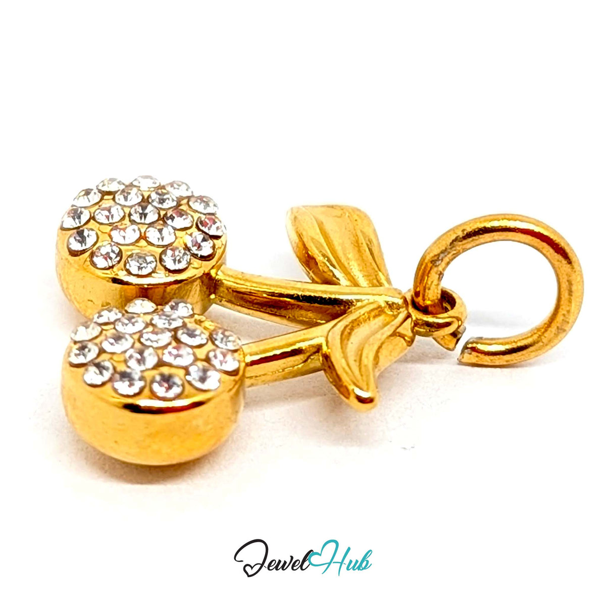 Angled view of the gold-tone crystal cherry charm - JewelHub