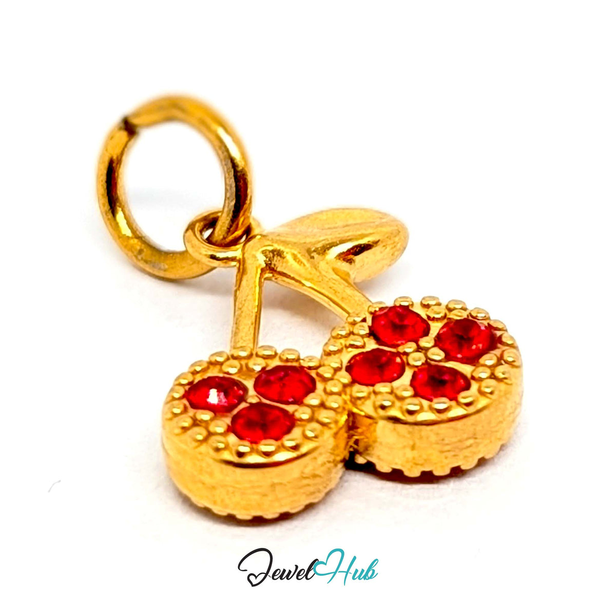 Close-up of the gold-tone red stone cluster cherry charm detail - JewelHub