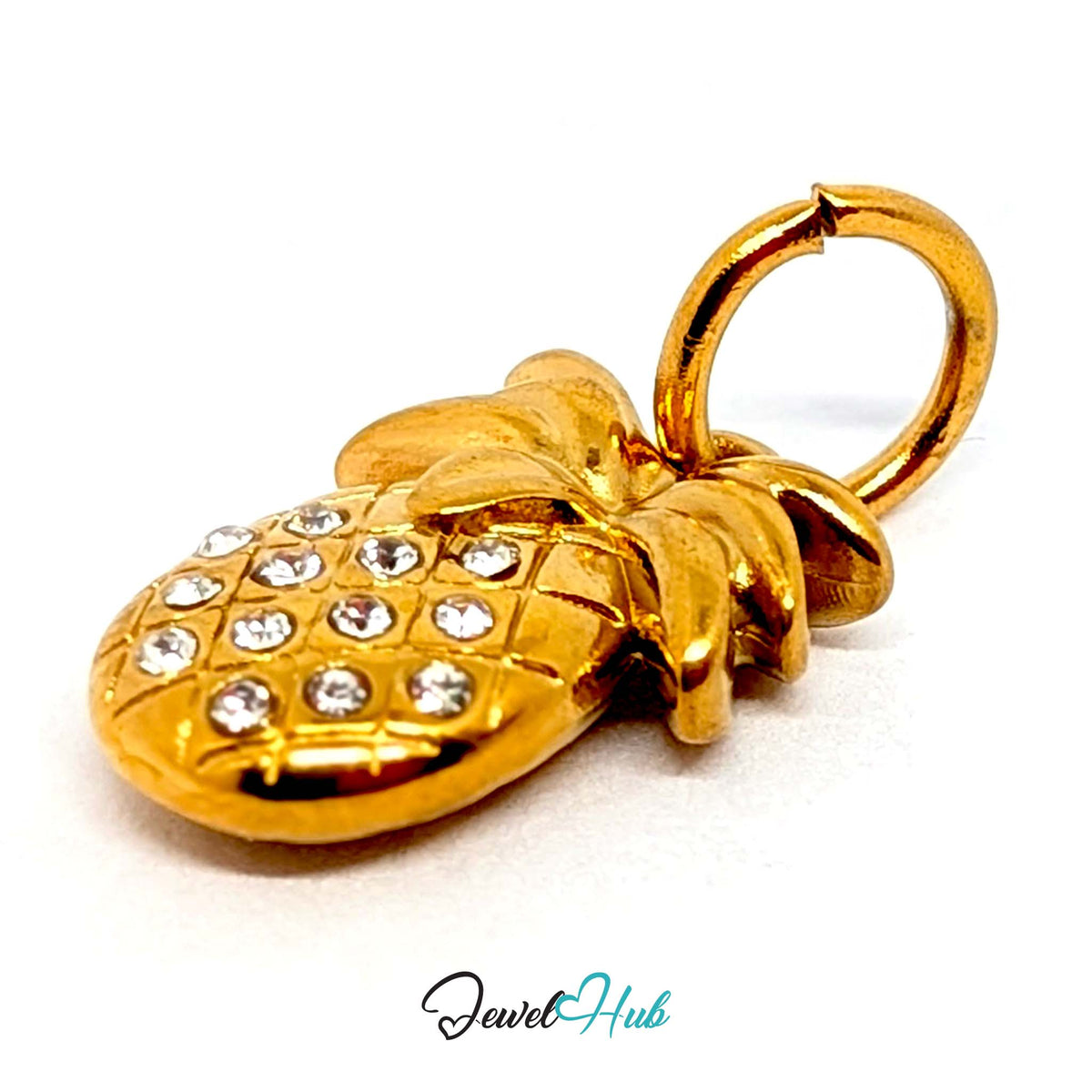 Angled view of the gold-tone crystal pineapple charm - JewelHub
