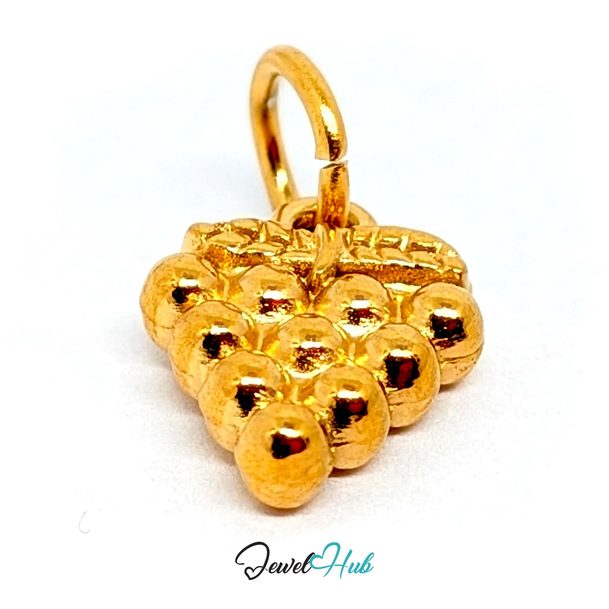 Close-up of the gold-tone beaded grape bunch charm detail - JewelHub