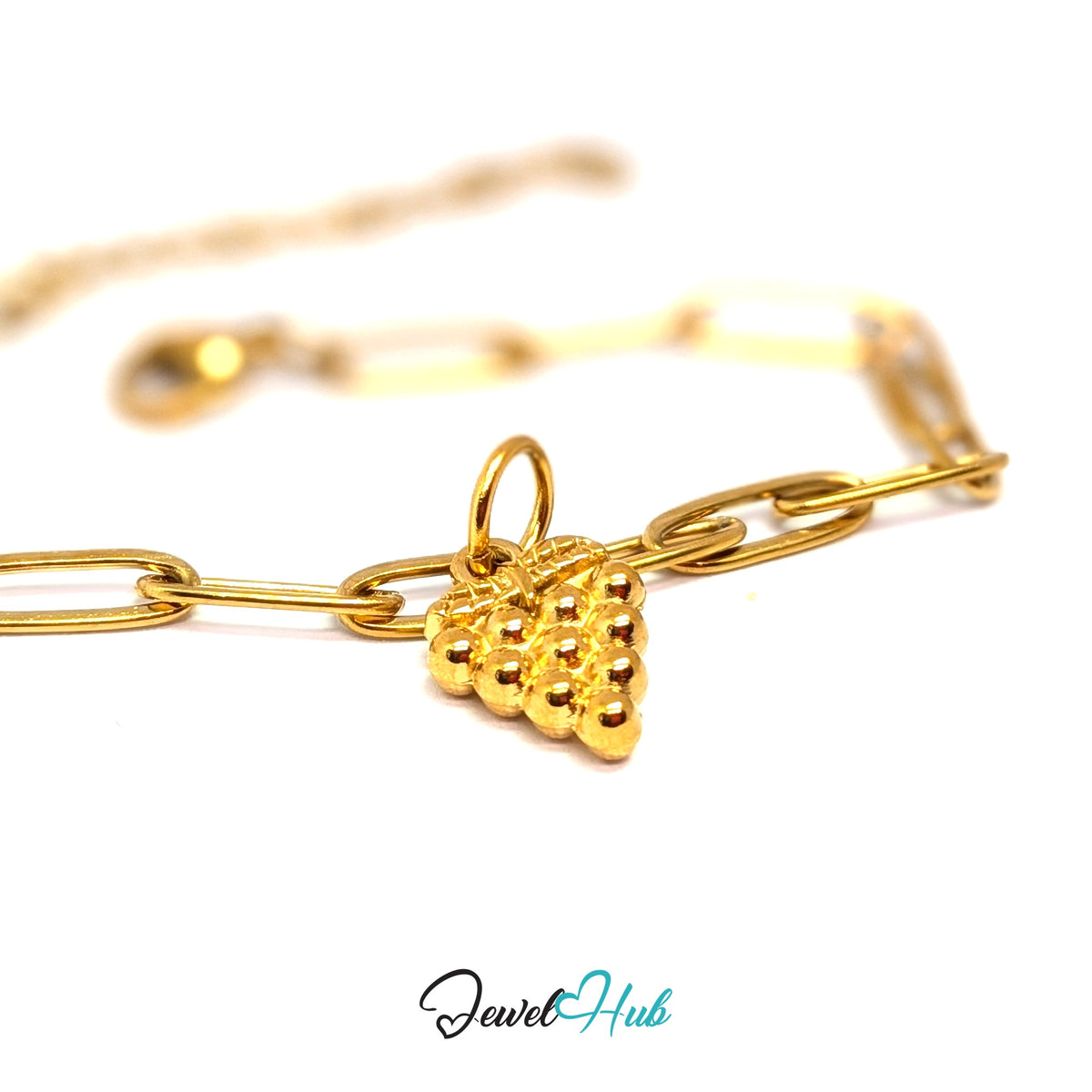 Gold-tone beaded grape bunch charm styled on a gold paperclip chain bracelet - JewelHub