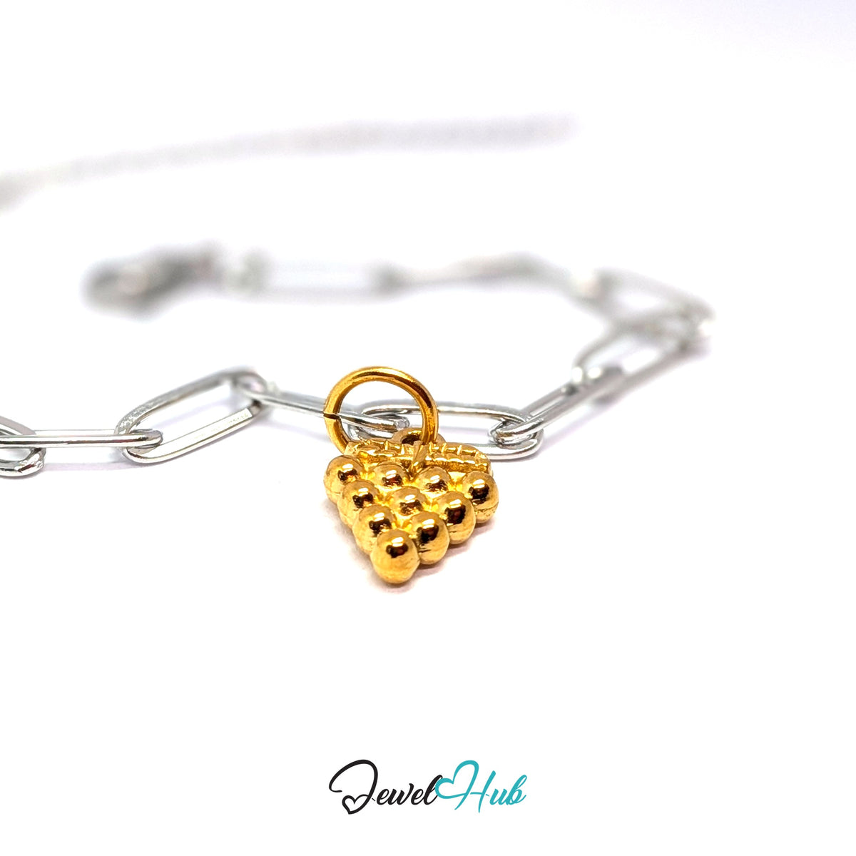Gold-tone beaded grape bunch charm styled on a silver paperclip chain bracelet for a two-tone look - JewelHub