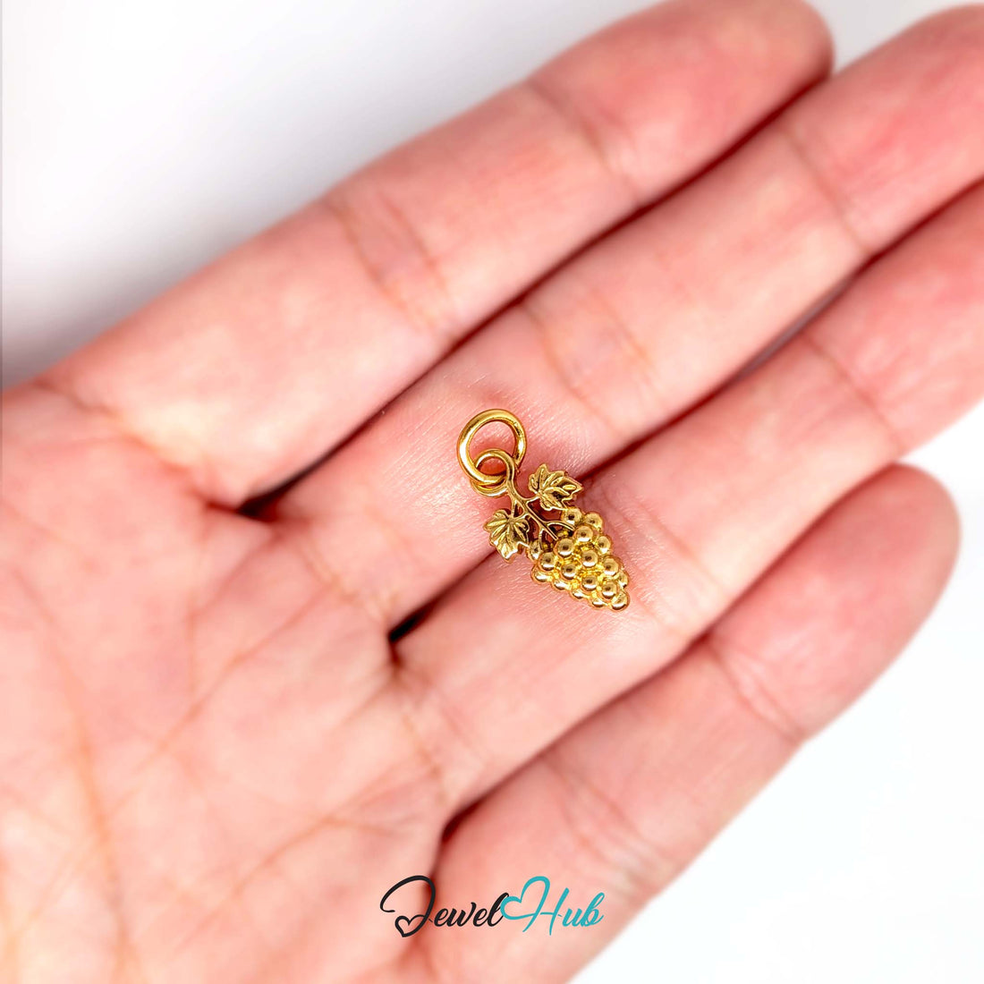 Grape bunch with leaves charm in gold-tone stainless steel - JewelHub
