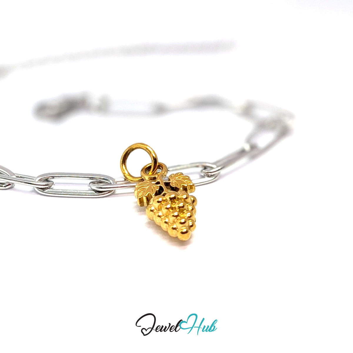 Gold-tone grape bunch with leaves charm styled on a silver paperclip chain bracelet for a two-tone look - JewelHub