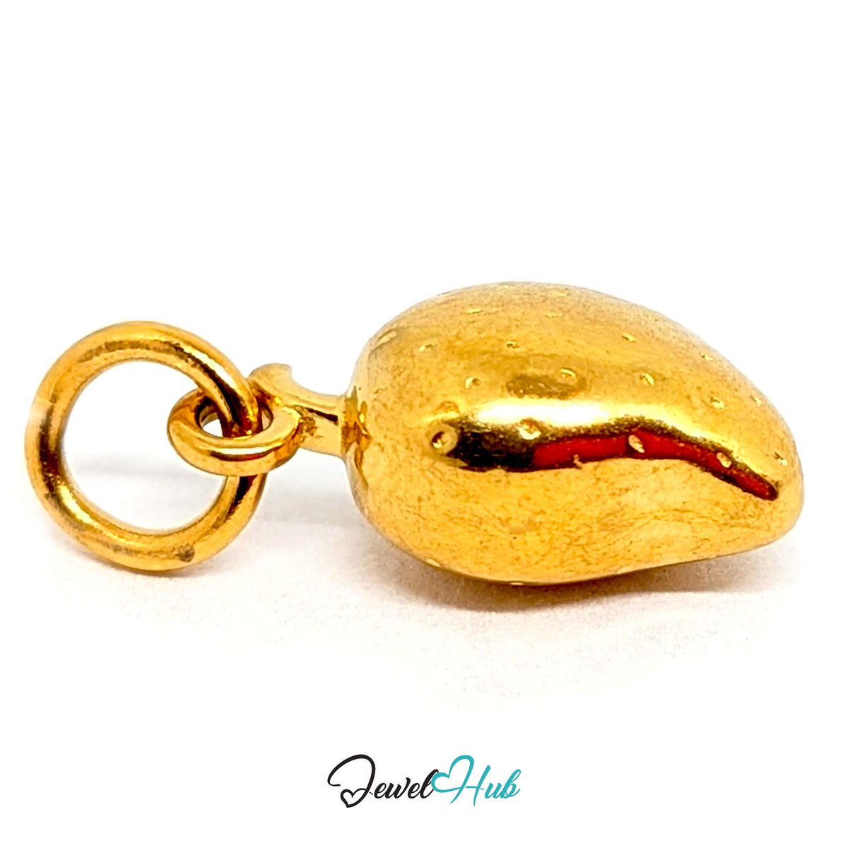 Angled view of the gold-tone mango charm - JewelHub