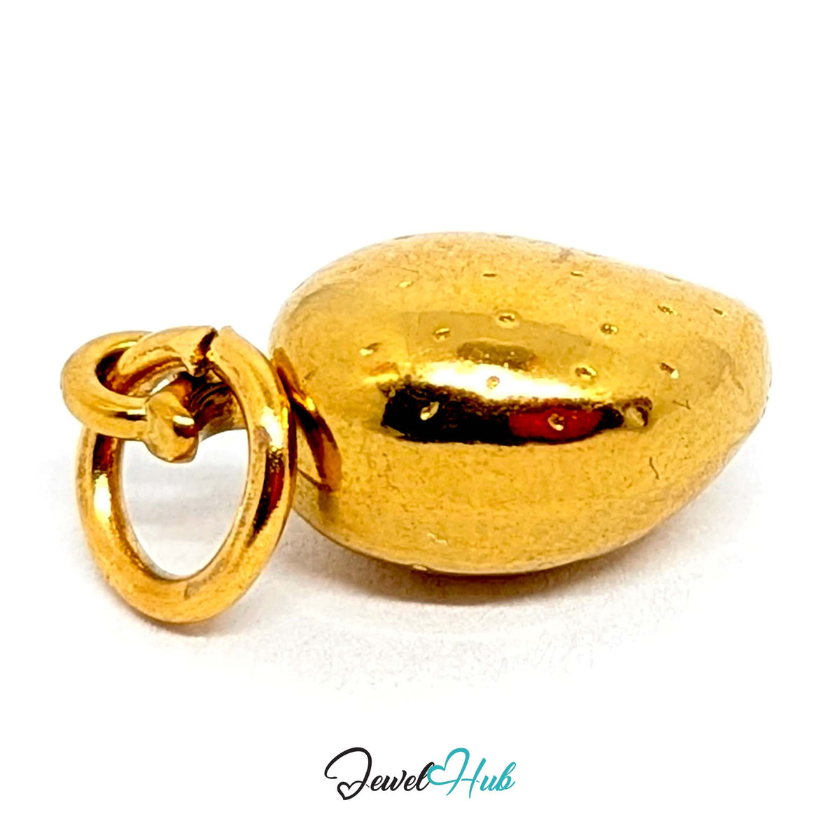 Side view of the gold-tone mango charm - JewelHub