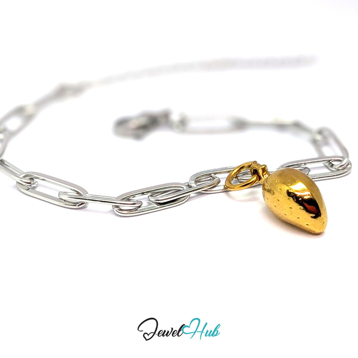 Gold-tone mango charm styled on a silver paperclip chain bracelet for a two-tone look - JewelHub