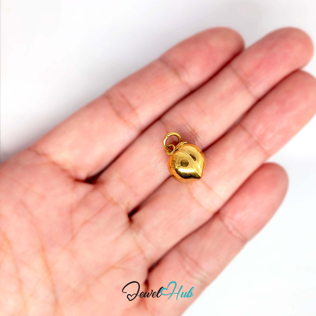 Peach charm in gold-tone stainless steel - JewelHub