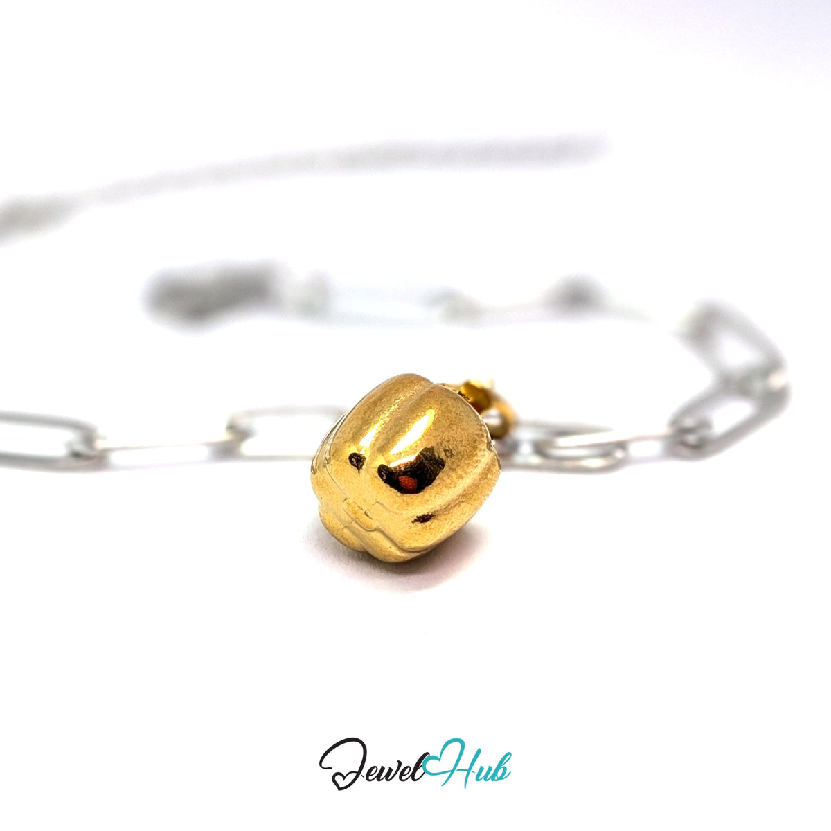 Gold-tone bell pepper charm styled on a silver paperclip chain bracelet for a two-tone look - JewelHub