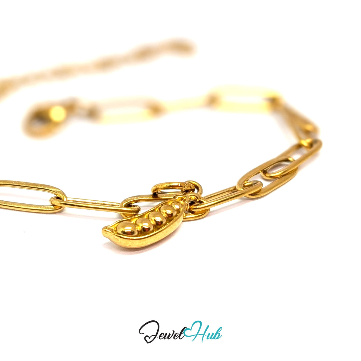 Gold-tone pea pod charm styled on a gold paperclip chain bracelet - JewelHub