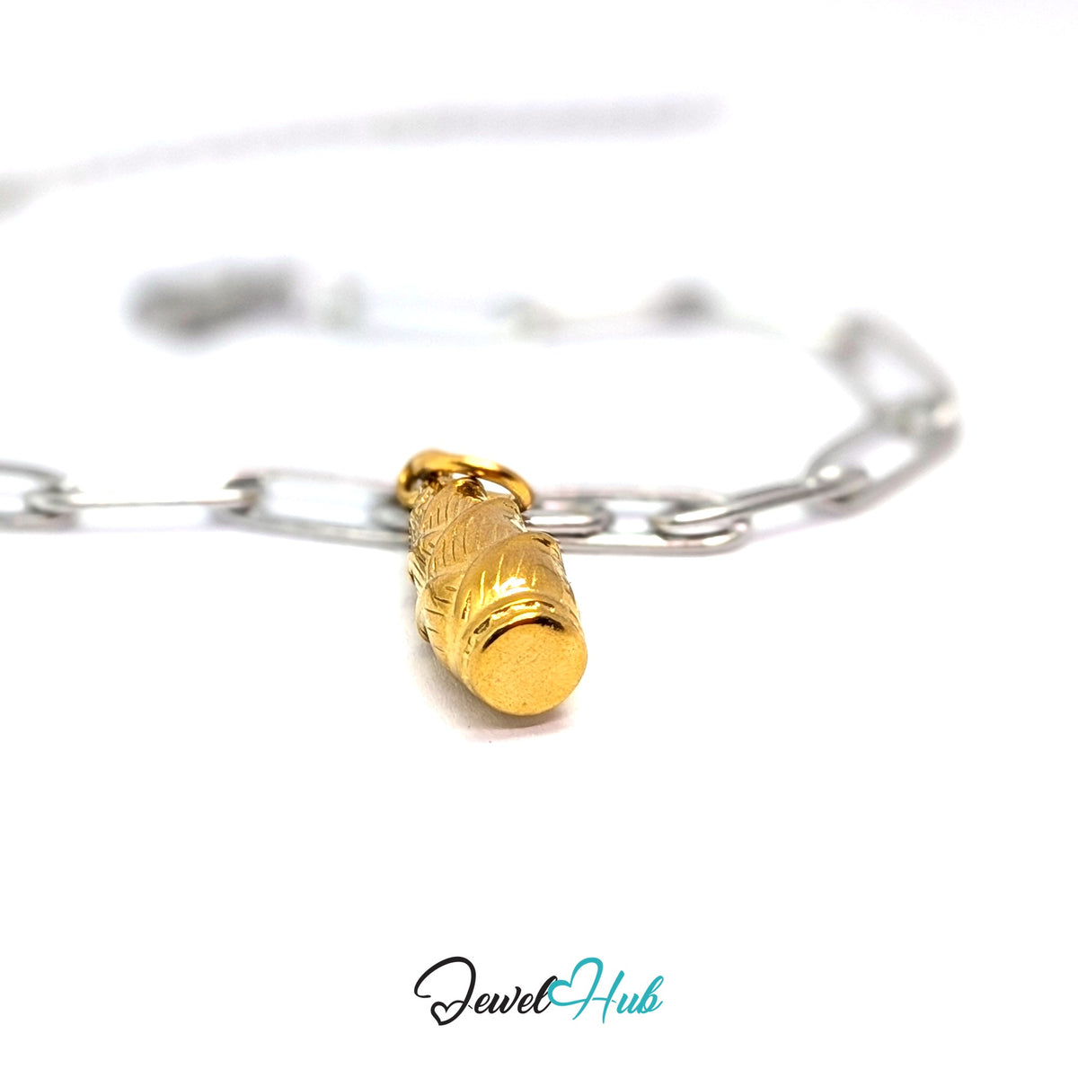 Gold-tone corn in husk charm styled on a silver paperclip chain bracelet for a two-tone look - JewelHub