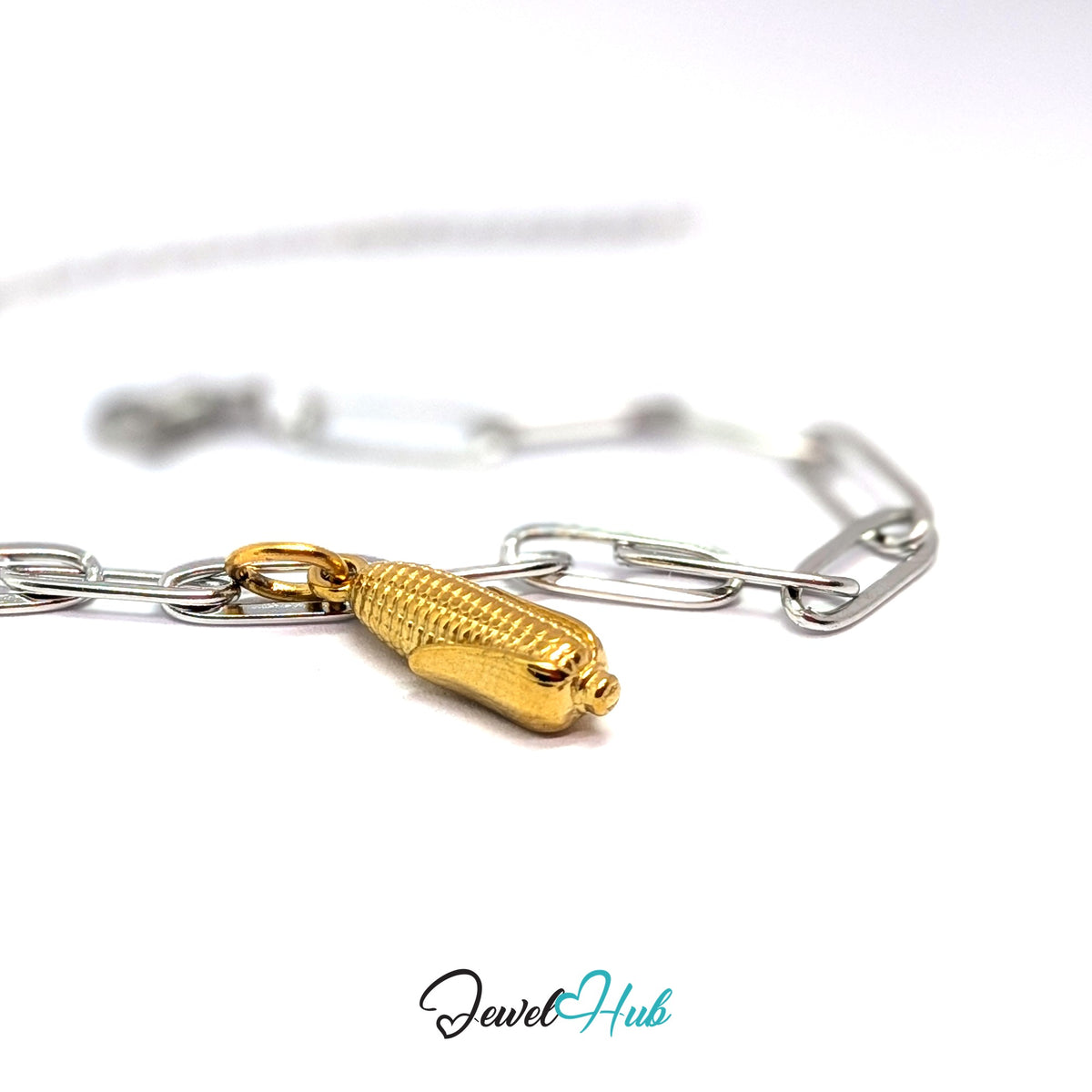 Gold-tone corn on the cob charm styled on a silver paperclip chain bracelet for a two-tone look - JewelHub
