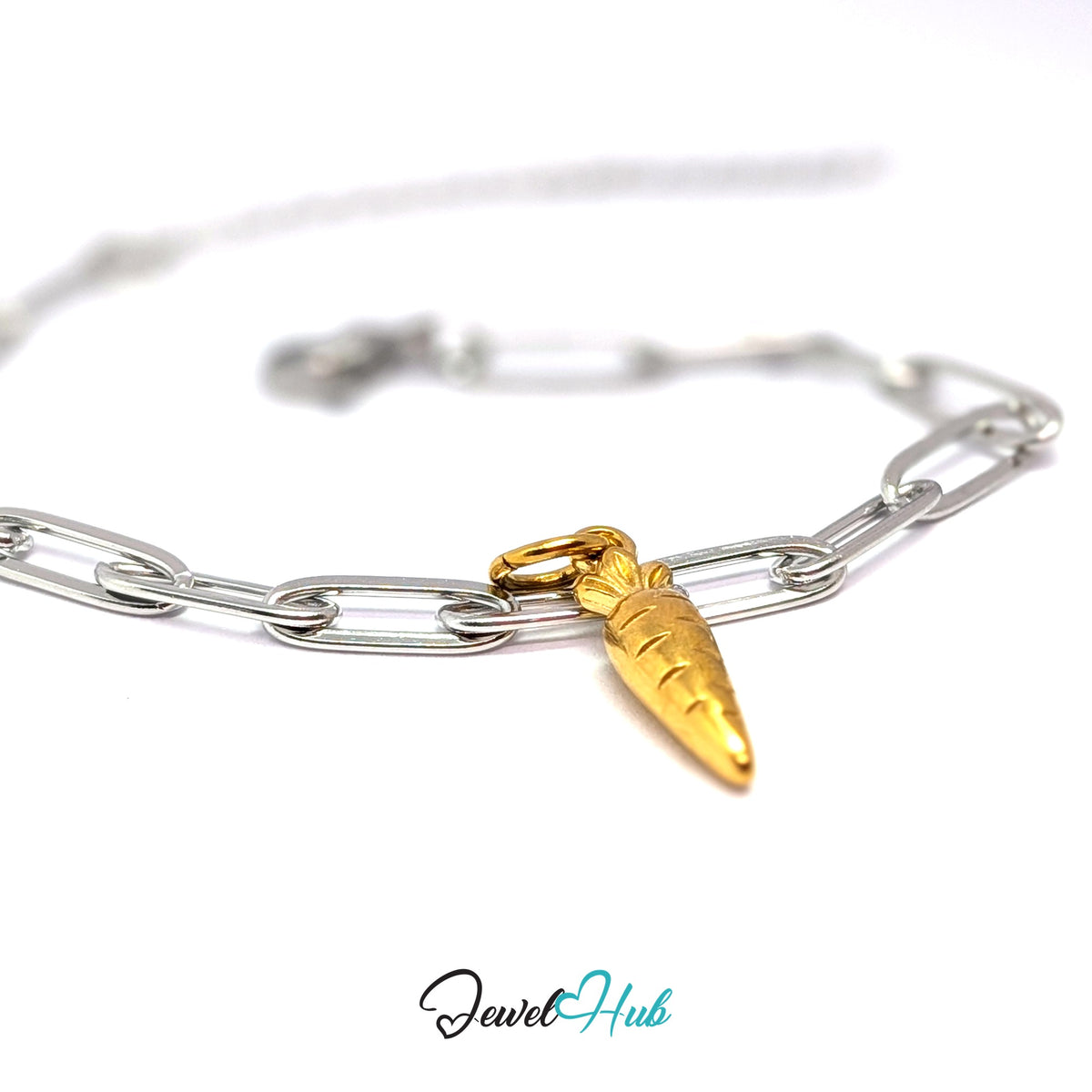Gold-tone mini carrot charm styled on a silver paperclip chain bracelet for a two-tone look - JewelHub