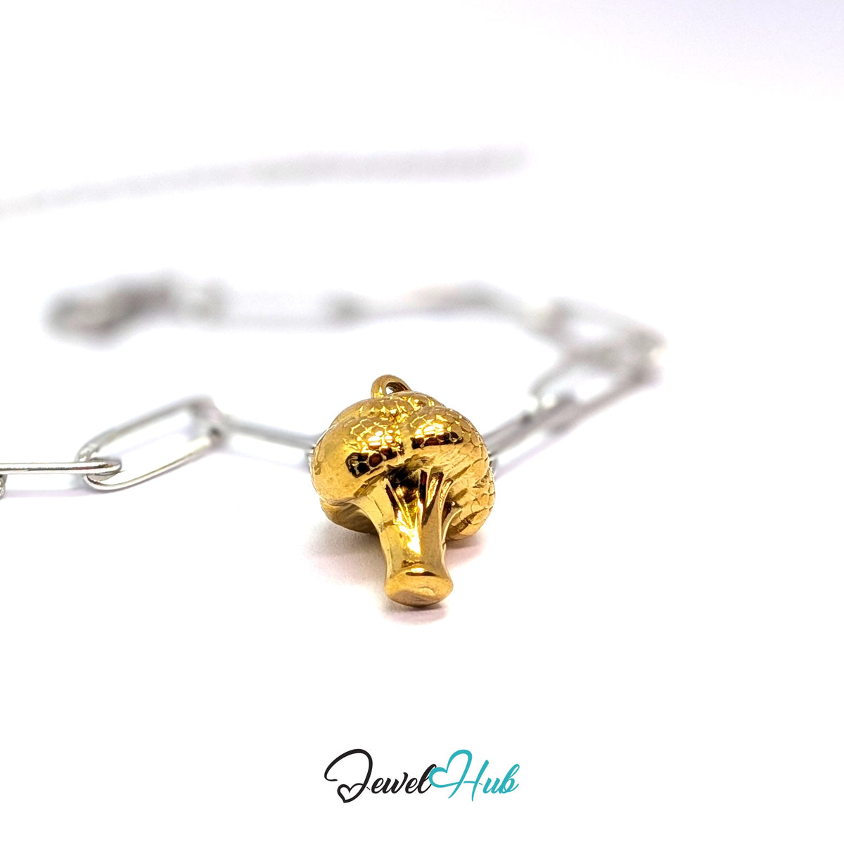 Gold-tone 3D broccoli charm styled on a silver paperclip chain bracelet for a two-tone look - JewelHub