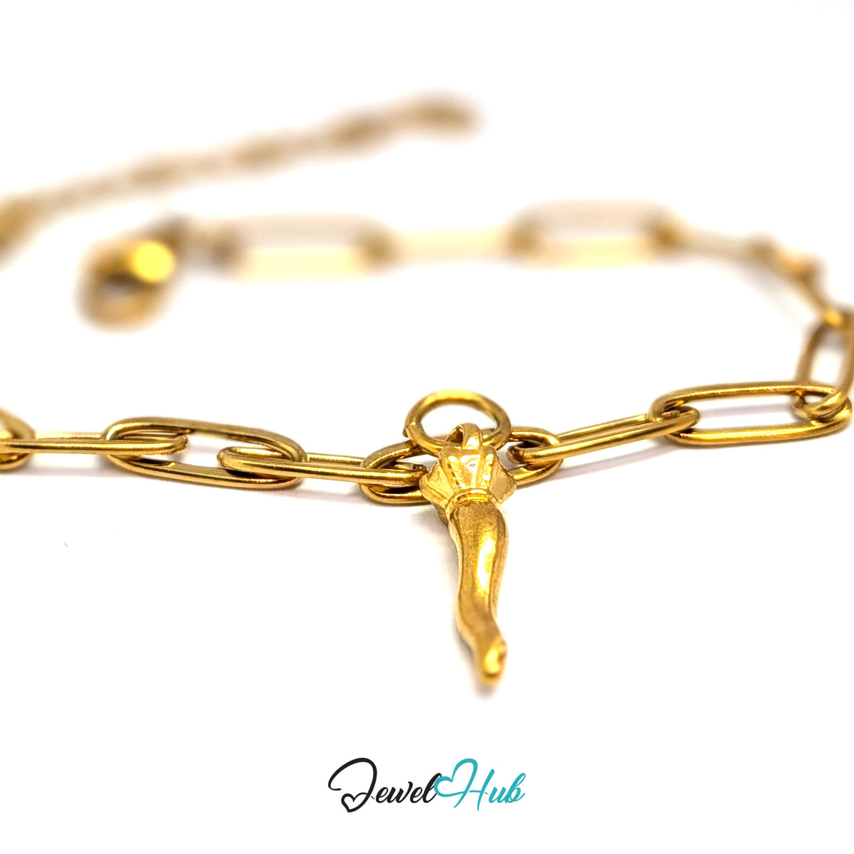 Gold-tone twisted long pepper charm styled on a gold paperclip chain bracelet - JewelHub