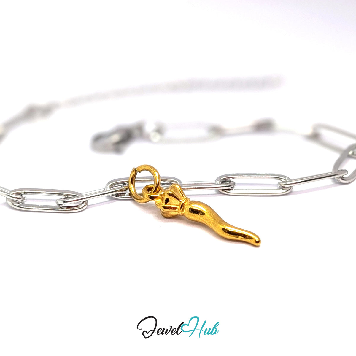 Gold-tone twisted long pepper charm styled on a silver paperclip chain bracelet for a two-tone look - JewelHub