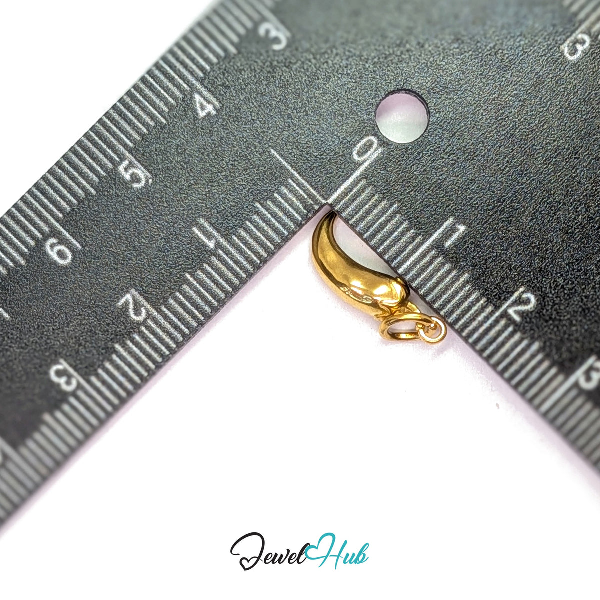 Curved chilli pepper charm measured against a ruler at 6.2mm wide by 17.8mm tall - JewelHub