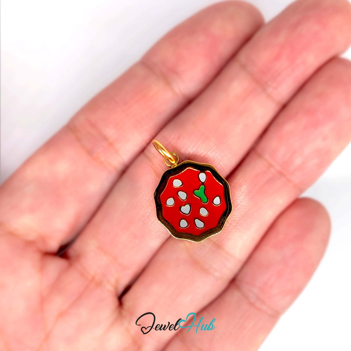 Pizza charm held in a hand to show its size - JewelHub