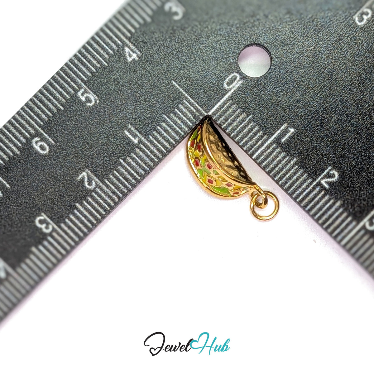 Taco charm measured against a ruler at 6.2mm wide by 17.6mm tall - JewelHub