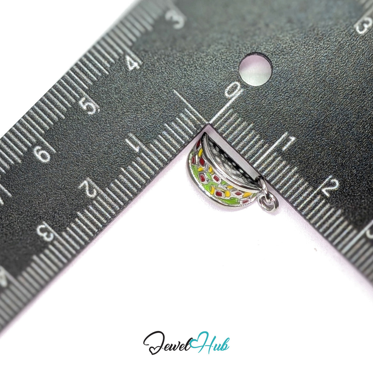 Taco charm measured against a ruler at 6.2mm wide by 17.6mm tall - JewelHub