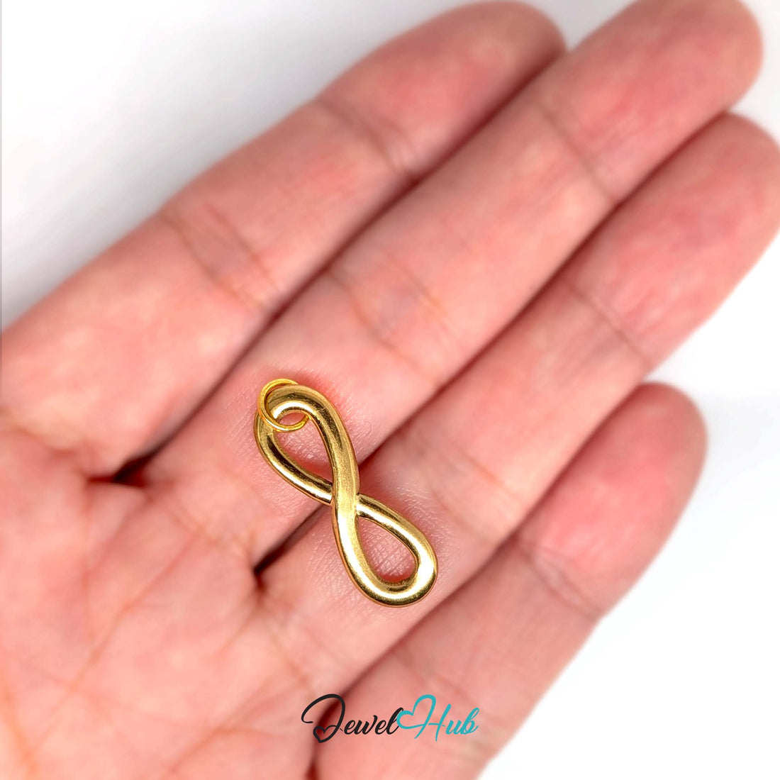 Infinity charm in gold-tone stainless steel - JewelHub