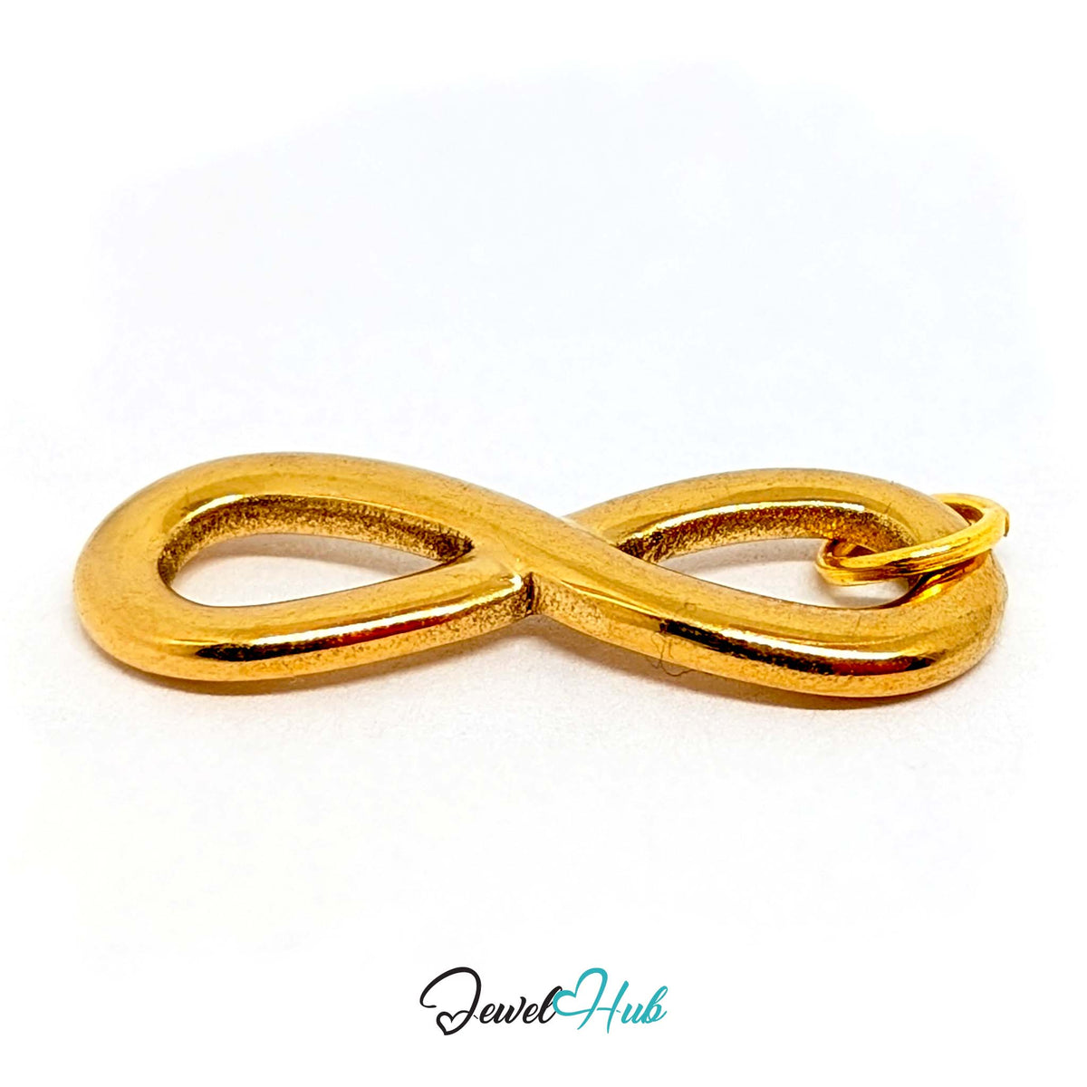 Angled view of the gold-tone infinity charm - JewelHub