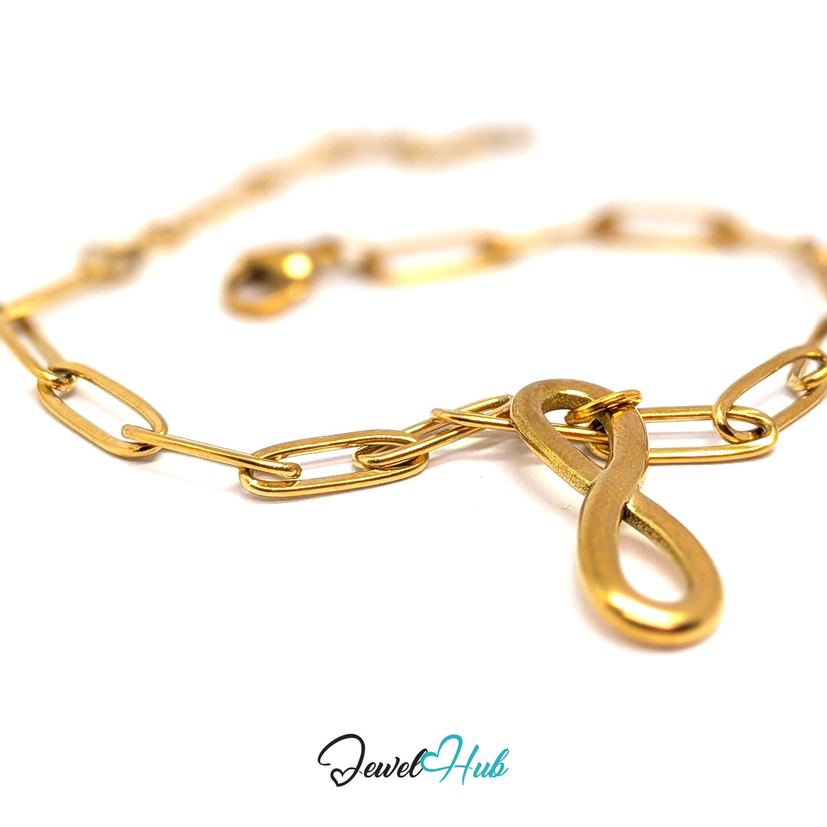 Gold-tone infinity charm styled on a gold paperclip chain bracelet - JewelHub