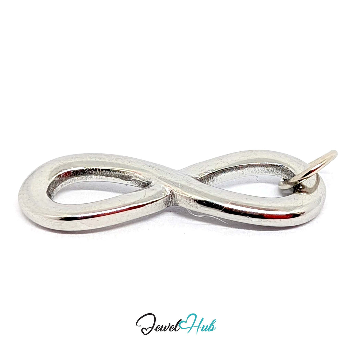 Angled view of the silver-tone infinity charm - JewelHub