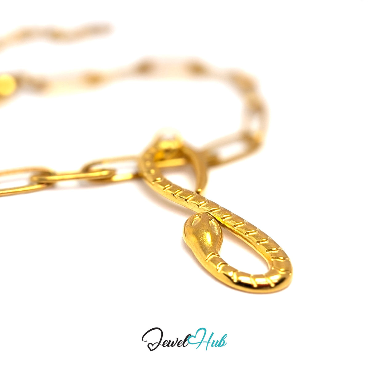 Gold-tone infinity snake charm styled on a gold paperclip chain bracelet - JewelHub