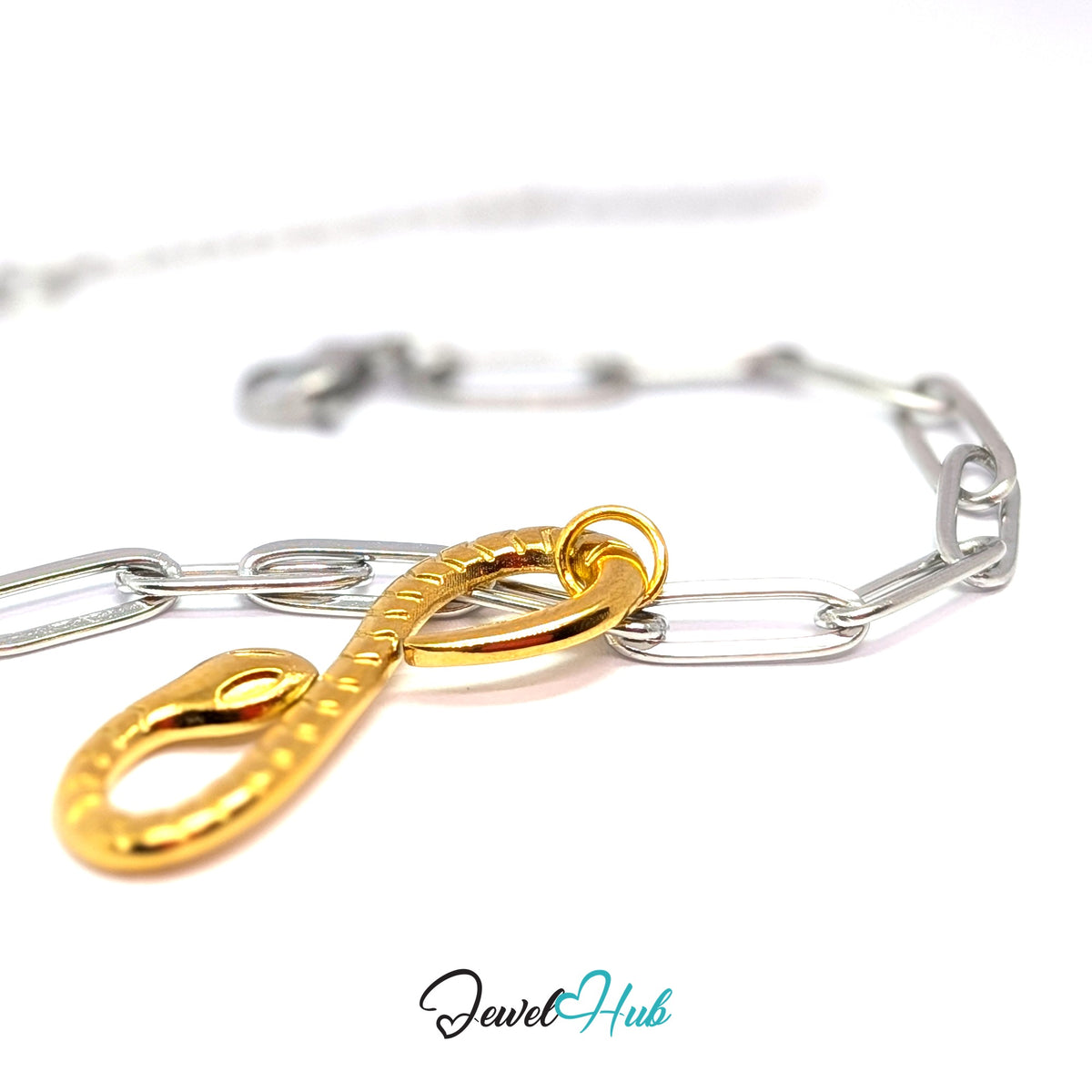 Gold-tone infinity snake charm styled on a silver paperclip chain bracelet for a two-tone look - JewelHub