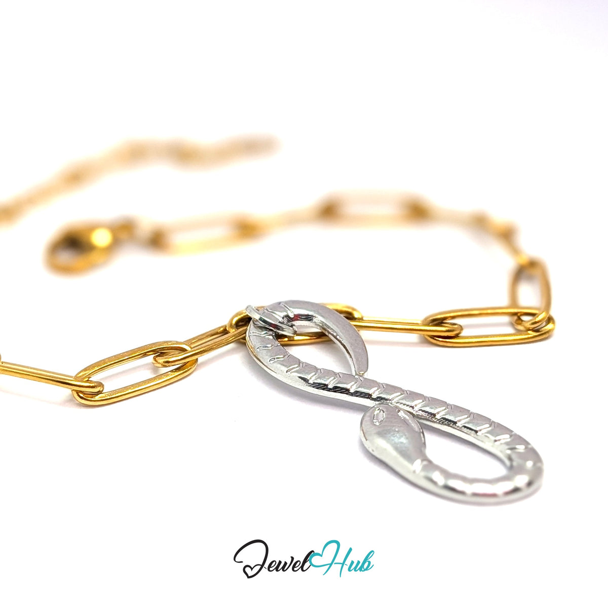 Silver-tone infinity snake charm styled on a gold paperclip chain bracelet for a two-tone look - JewelHub