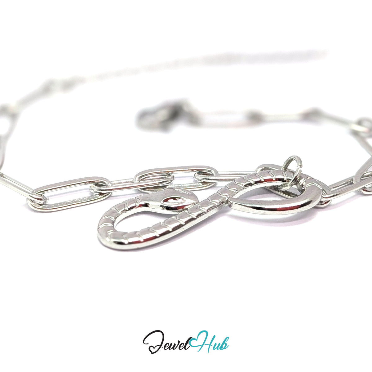 Silver-tone infinity snake charm styled on a silver paperclip chain bracelet - JewelHub