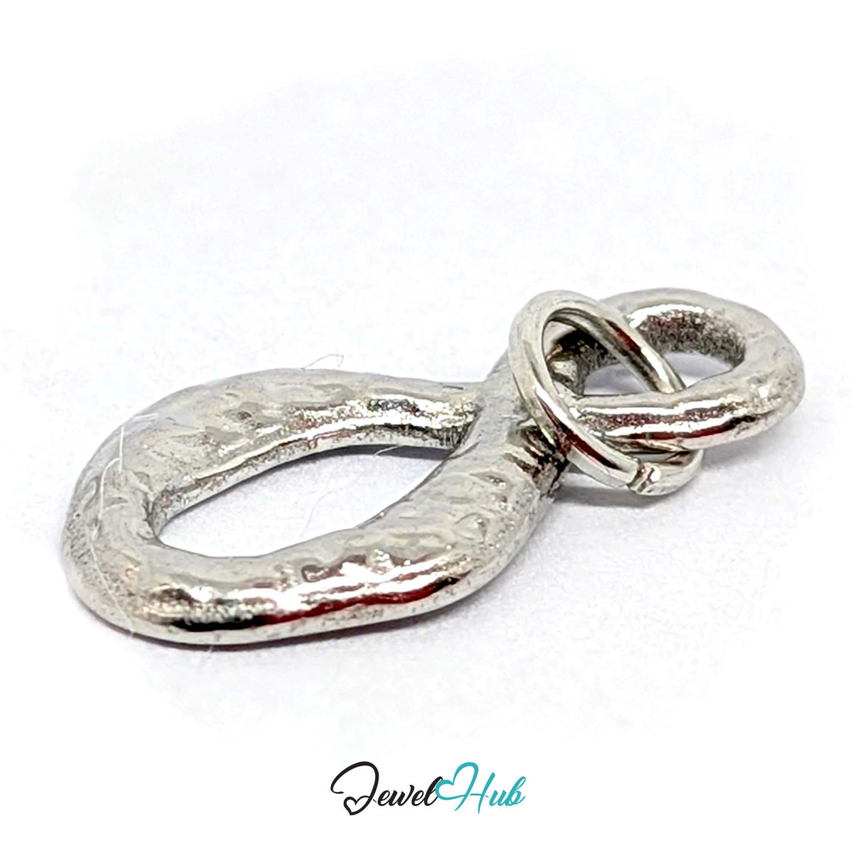 Angled view of the silver-tone textured infinity charm - JewelHub