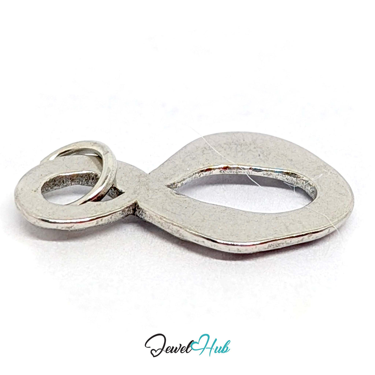 Close-up of the silver-tone textured infinity charm detail - JewelHub