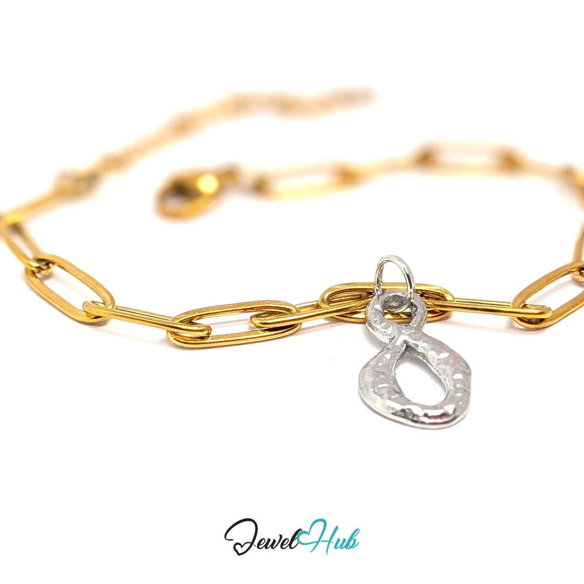 Silver-tone textured infinity charm styled on a gold paperclip chain bracelet for a two-tone look - JewelHub