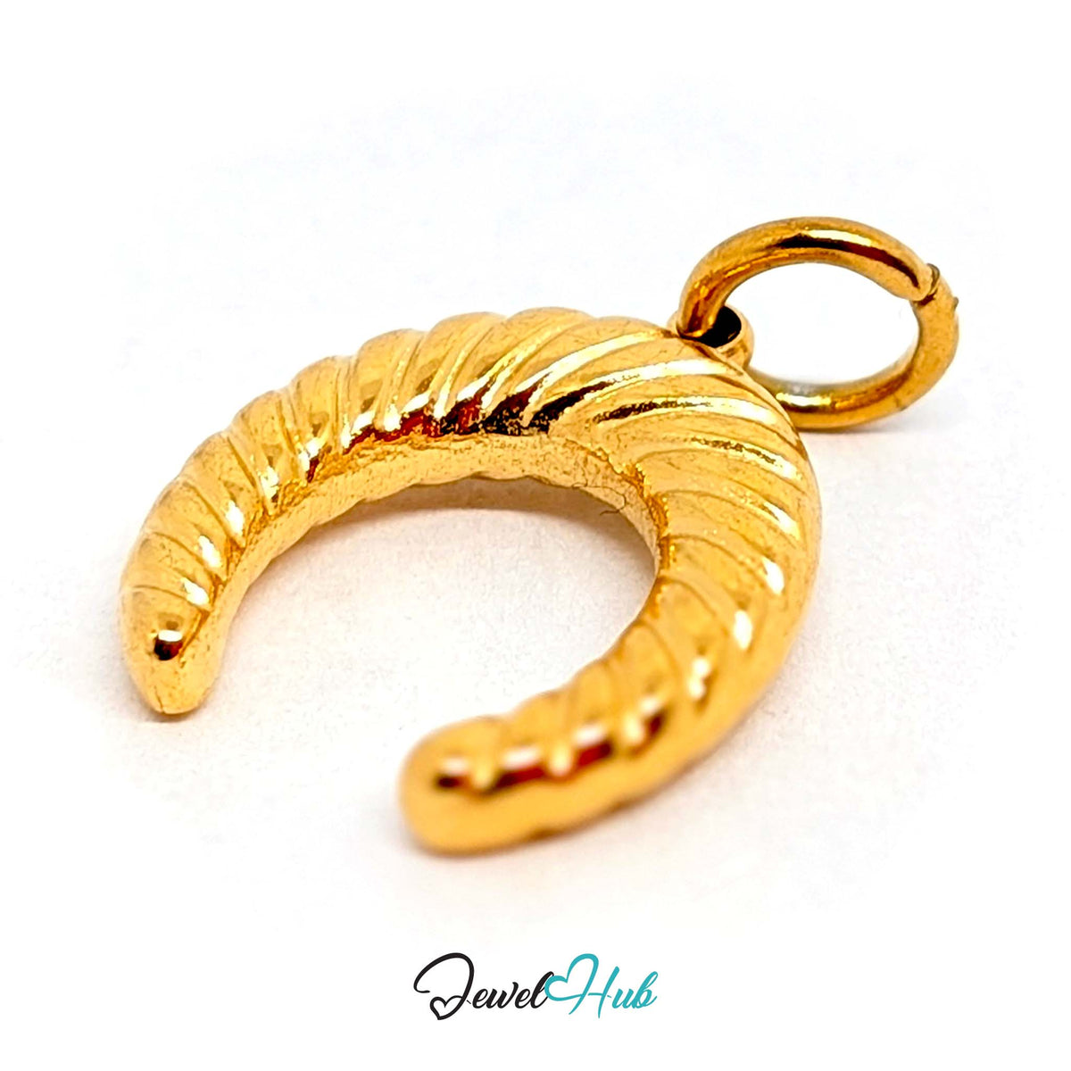 Angled view of the gold-tone ribbed horseshoe charm - JewelHub