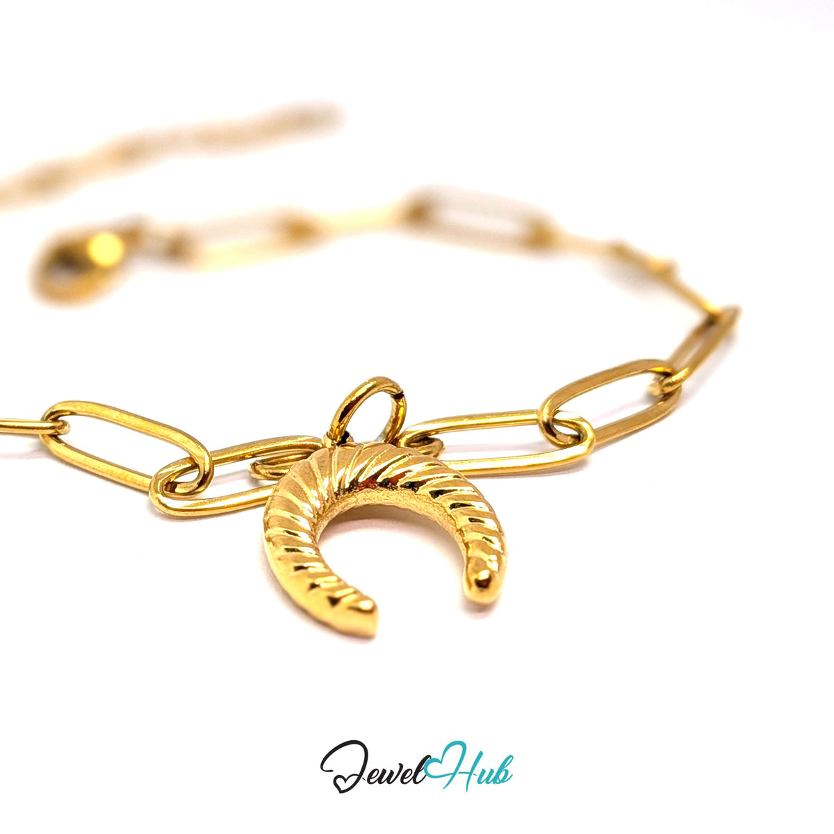 Gold-tone ribbed horseshoe charm styled on a gold paperclip chain bracelet - JewelHub