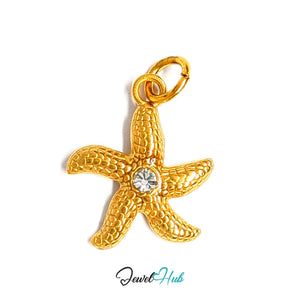 Textured starfish charm in gold-tone stainless steel, with clear glue-set crystals - JewelHub