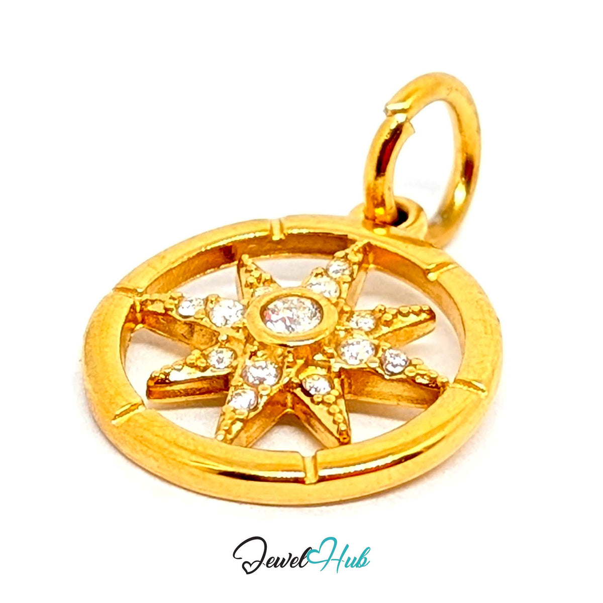 Angled view of the gold-tone crystal star compass charm - JewelHub