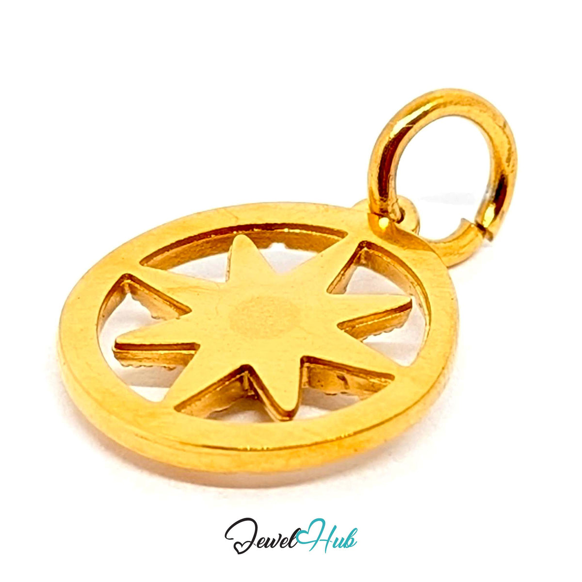 Close-up of the gold-tone crystal star compass charm detail - JewelHub