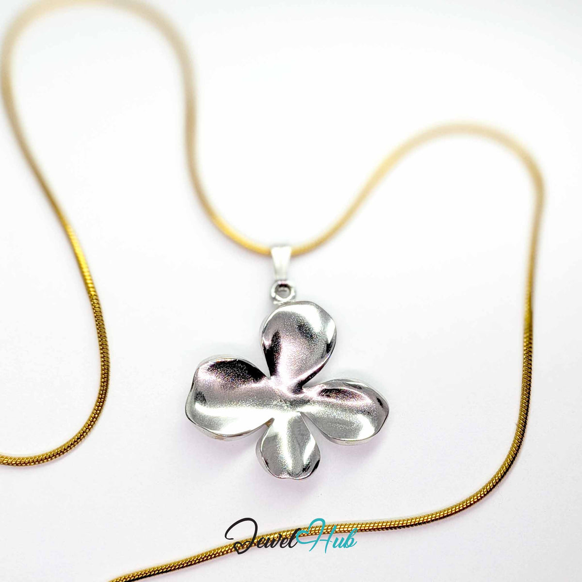 Silver Wavy Four Petal Flower pendant in silver-tone stainless steel - on a gold-tone stainless steel chain - JewelHub
