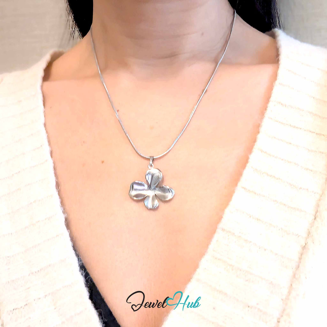 Silver Wavy Four Petal Flower pendant in silver-tone stainless steel - front view - JewelHub