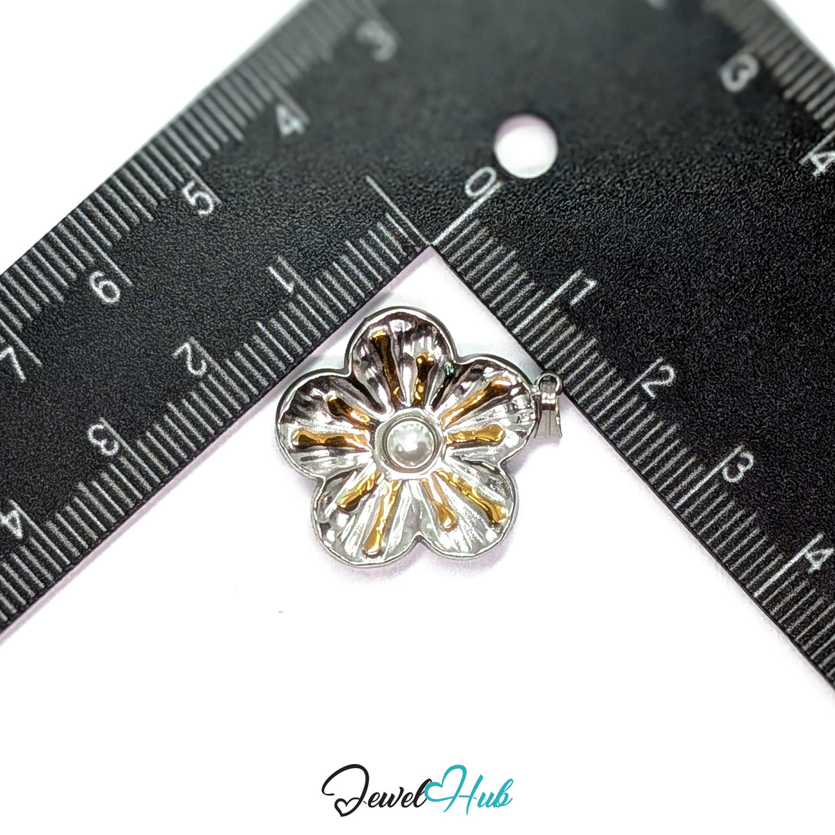 Sunray Pearl Flower pendant in DuoTone stainless steel - measurement with ruler - JewelHub
